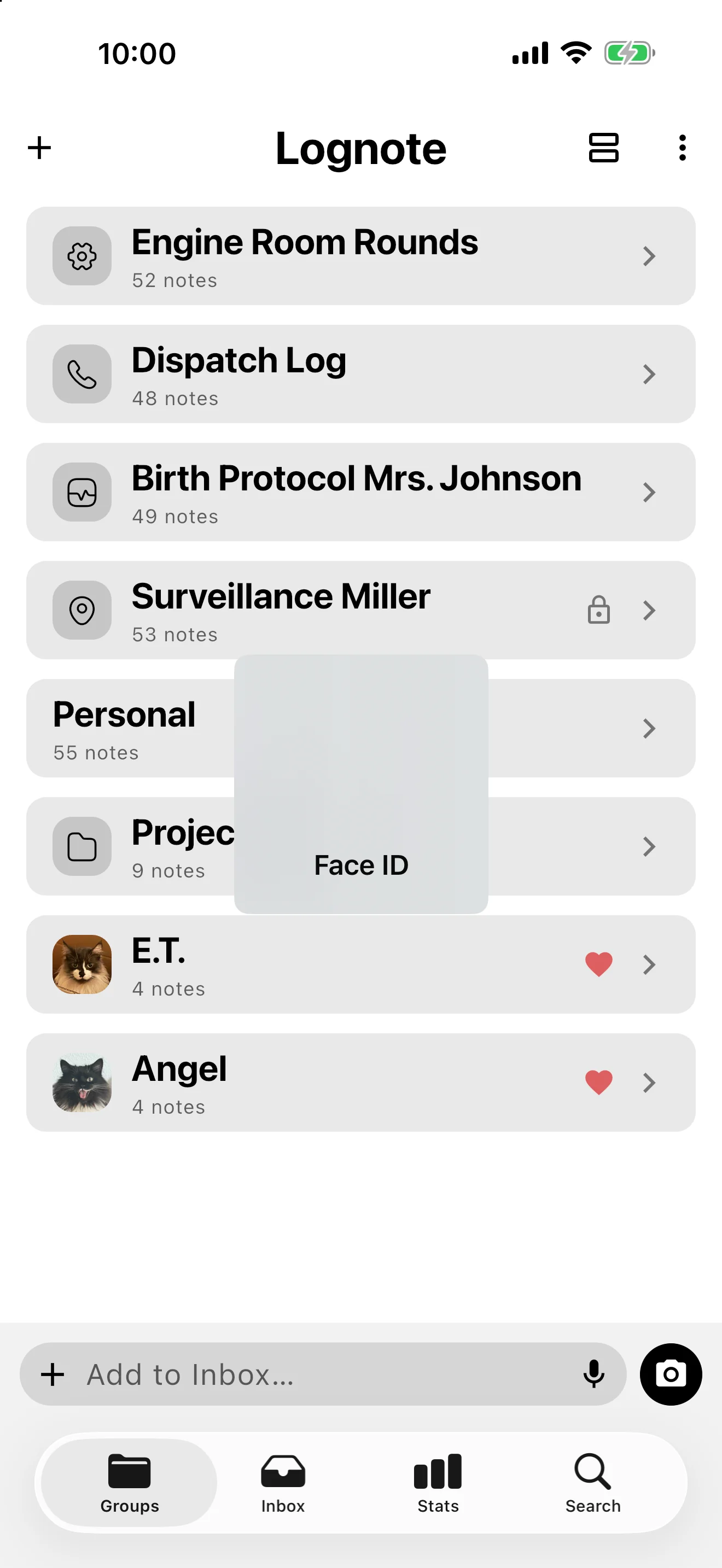 Screenshot: Genuine iOS Face ID dialog over a locked Lognote group